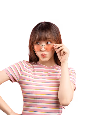 Young woman in pink striped shirt adjusting pink-tinted sunglasses with a surprised expression.